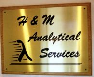 H & M ANALYTICAL – Black Filled Etched Brass Panel Mounted to a Wood Stained Panel in Allentown, PA