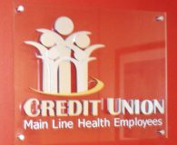MAIN LINE CREDIT UNION – Clear Acrylic Panel with Satin Aluminum & Brass Metalike™ Letters in Bryn Mawr, PA