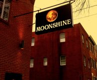 MOONSHINE - LED Illuminated Aluminum Stencil Cut Sign with White Acrylic Back-up Panel and Projecting Moon in Philadelphia