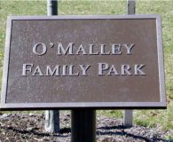 O’MALLEY FAMILY PARK – Cast Bronze Metal Plaque installed with Custom Bracket for an Angle Mount in Philadelphia